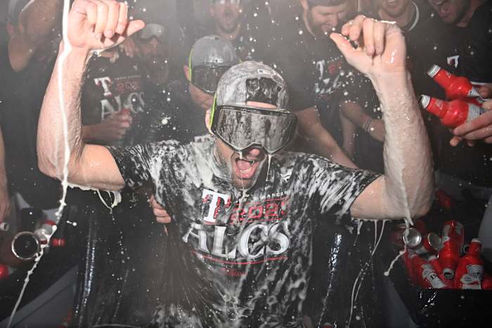 Oct 10, 2023; Arlington, Texas, USA; The Texas Rangers celebrate in the locker room after defeating the Baltimore Orioles in game three of the ALDS for the 2023 MLB playoffs at Globe Life Field. Nathan Eovaldi. Mandatory Credit: Jerome Miron-USA TODAY Sports